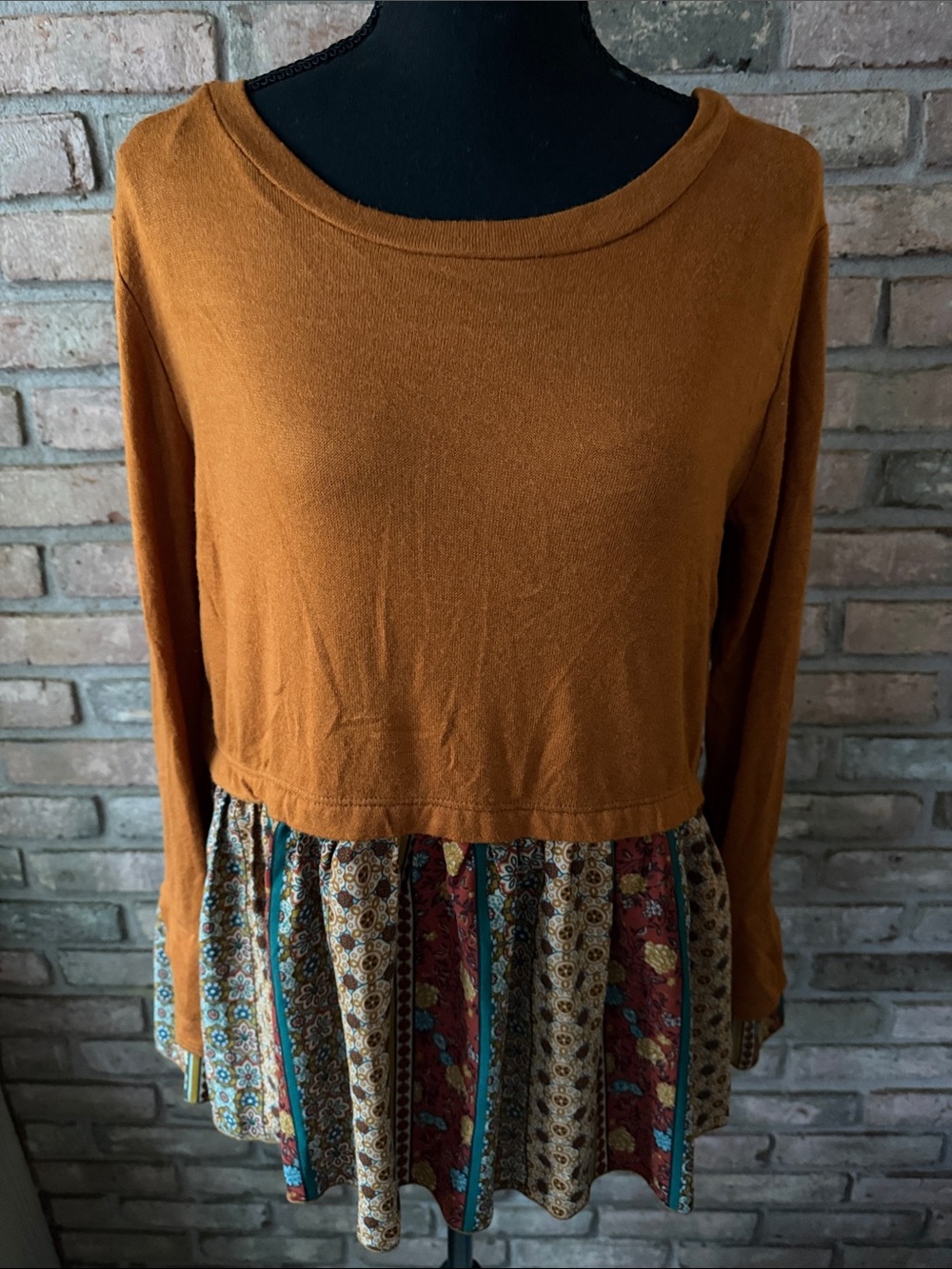 Rust Brown Long-Sleeve Peplum Top with Patterned Hem